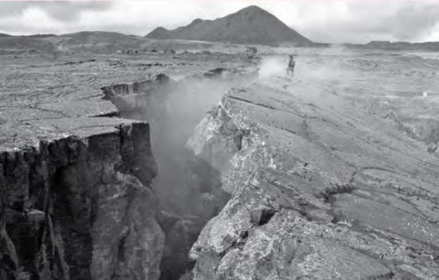 The Mid-Atlantic Ridge at Myvatn in northern Iceland. To your left, America; to your right, Europe; and below, water being boiled by the heat beneath.